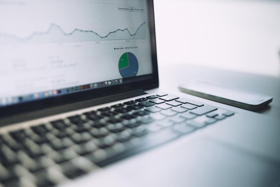Laptop displaying analytics charts